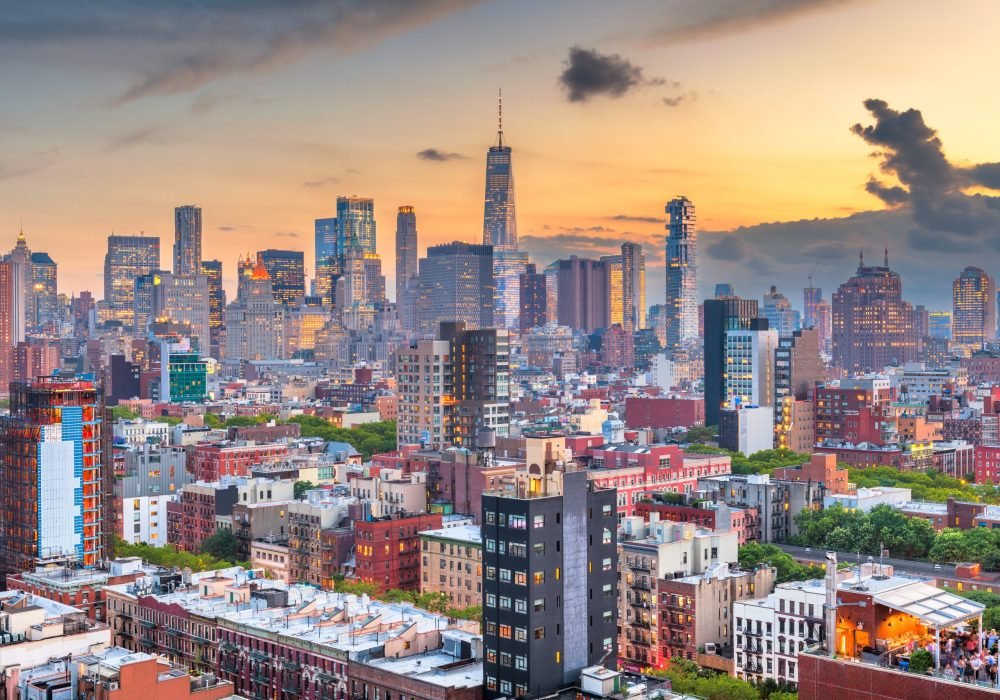 New York, New York, USA downtown city skyline over the Lower East Side at dusk.